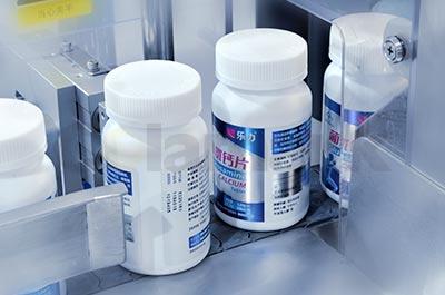 垂直輥子鏈?zhǔn)酱髨A瓶智能貼標(biāo)機