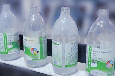 垂直輥子鏈?zhǔn)酱髨A瓶智能貼標(biāo)機