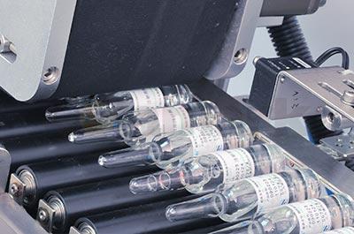 臥式圓瓶智能貼標(biāo)機(jī)